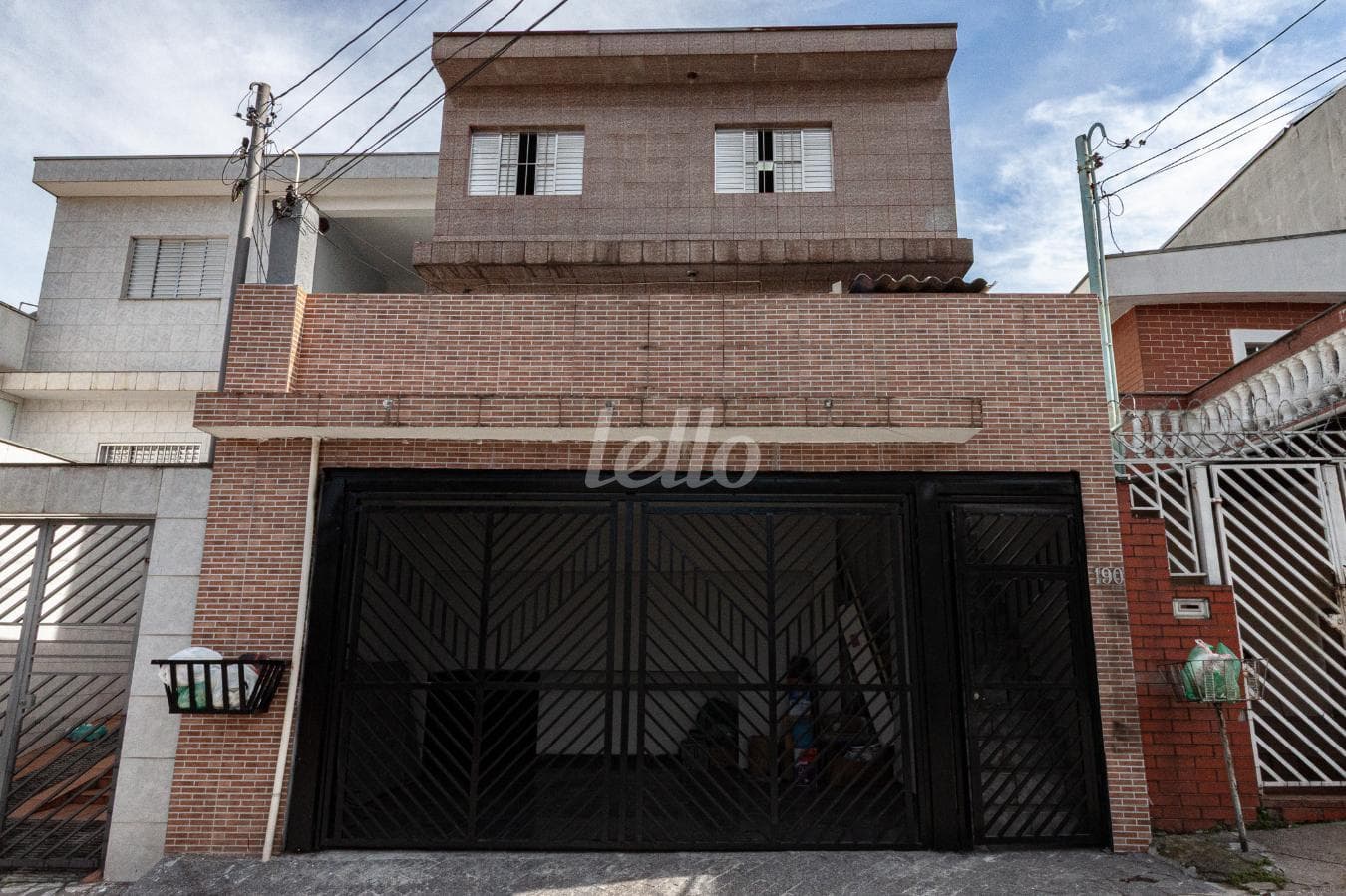 FACHADA de Casa sobrado com 149 m² em Jardim Record - São Paulo
