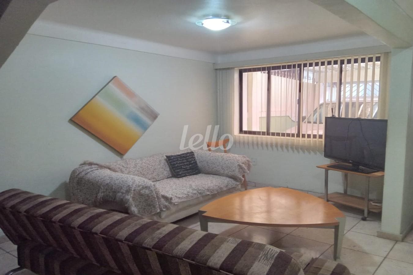 SALA DOIS AMBIENTES de Casa sobrado com 144 m² em Santana - São Paulo